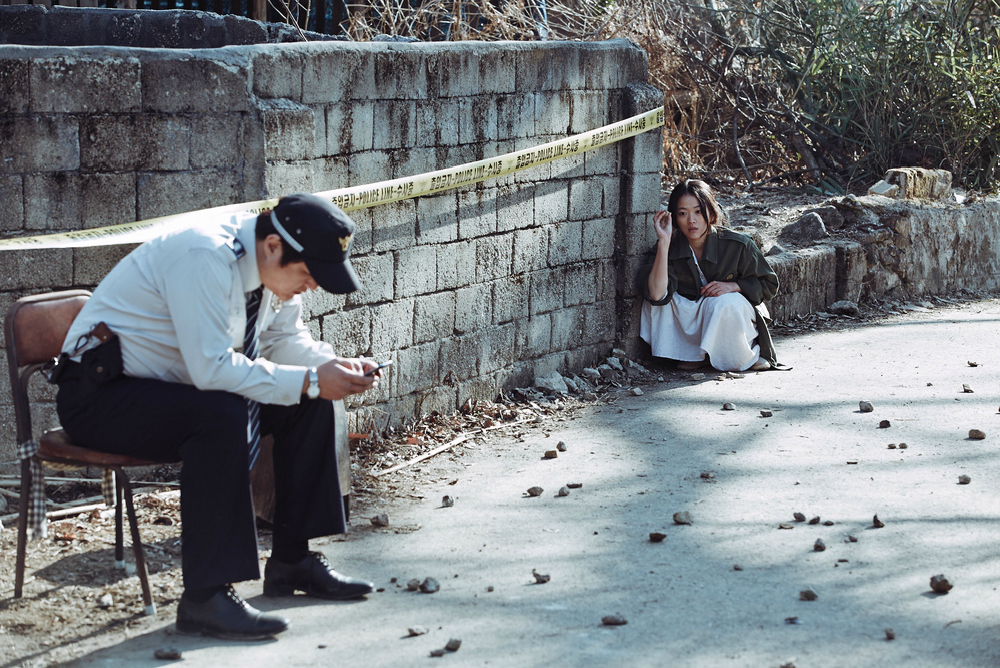 1-the-wailing-woman-throwing-rocks-at-jong-goo