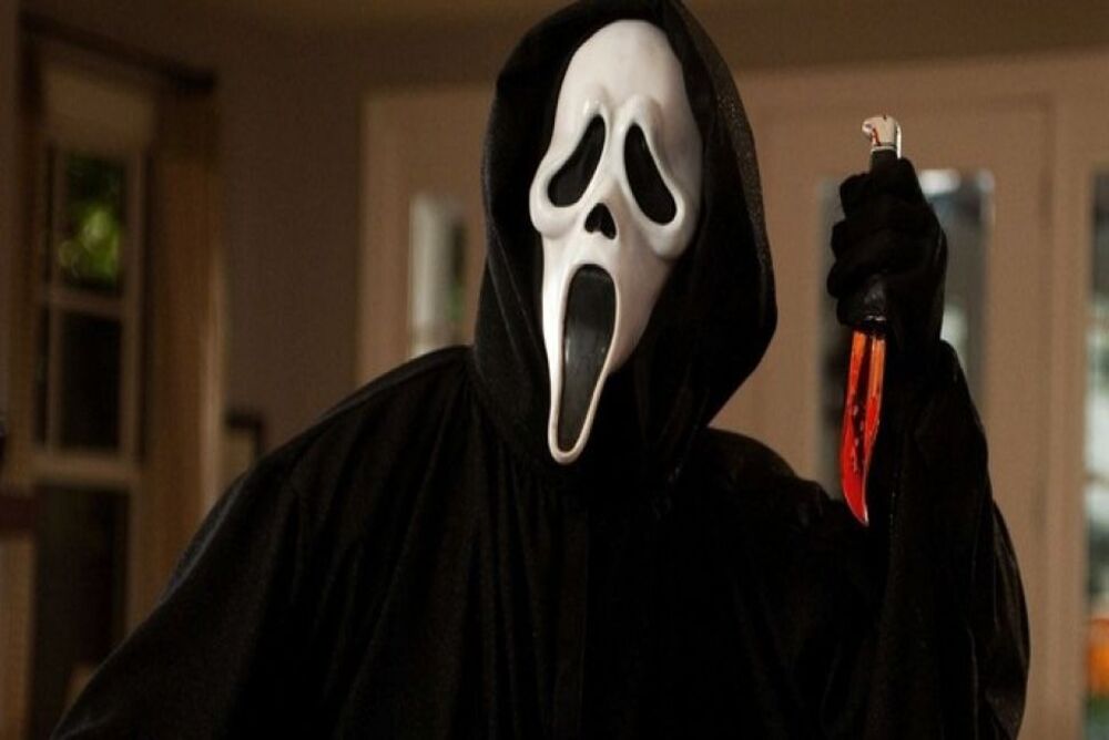 Scream masked killer with bloody knife